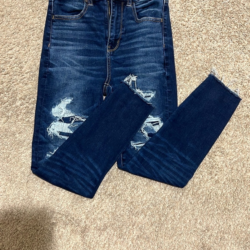 Distressed Blue Jeans